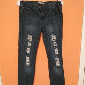 Torn legged Blue jeans